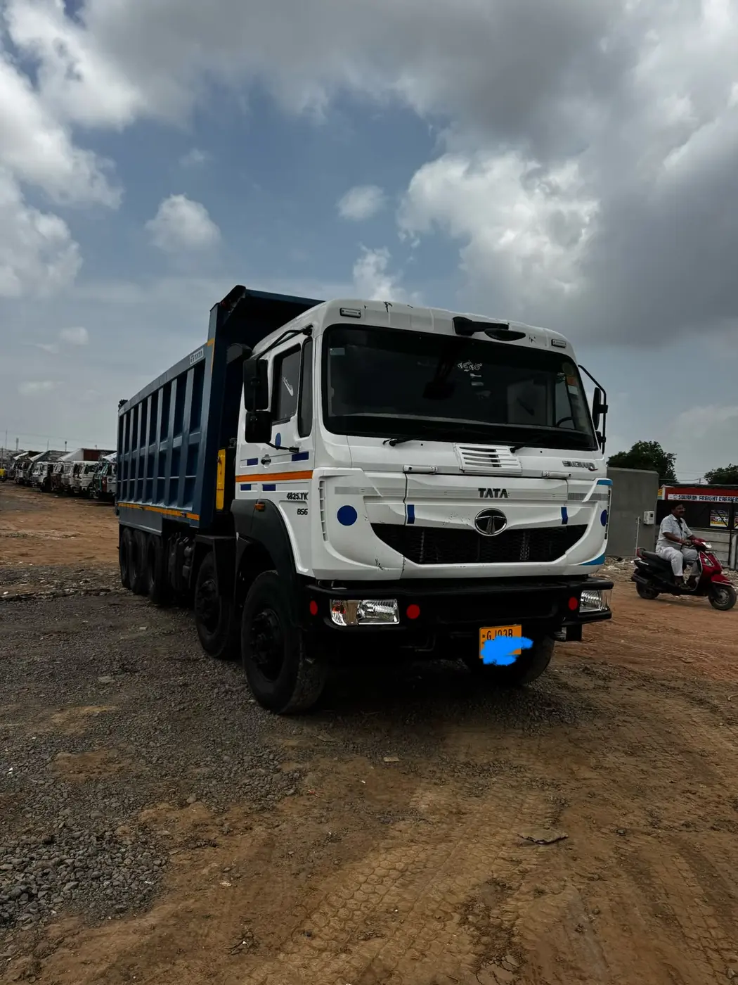 Meera Logistics heavy duty white TATA tipper truck